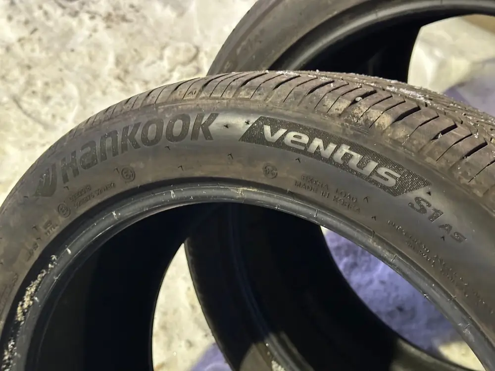 New tyre on the floor before fitting